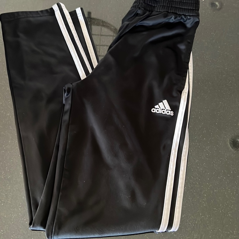 Adidas Big Boys track pant in black 3 white stripes Size L (14-16).